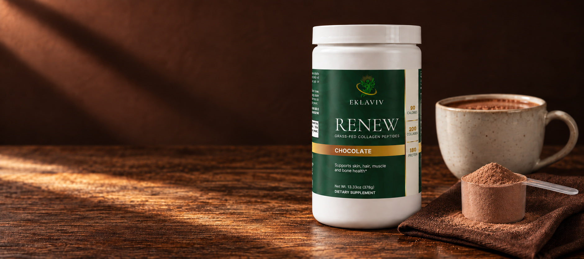 Renew Chocolate collagen powder bottle with a measured scoop and prepared chocolate drink on dark wood